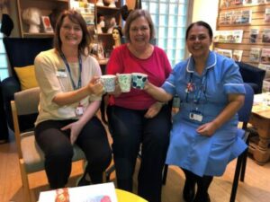 Rachel Alexander, Sue Roberts and Paula Ryan enjoy a mug of tea in the John Le Vay centre