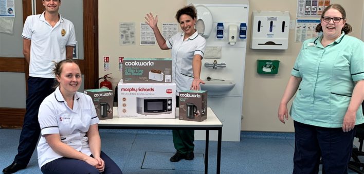 Photograph of 4 members of the Trauma and Orthopaedics team with their new kitchen gadgets