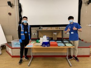 Michael Wu and Brian Chan volunteering in the vaccination hub at Colchester