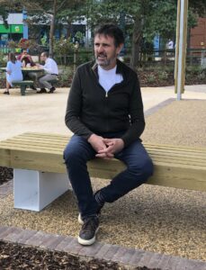 A man sitting on a bench
