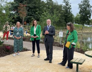 People officially opening a new wellbeing garden