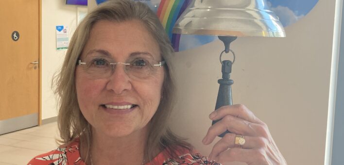 Patricia Leaver rings the bell